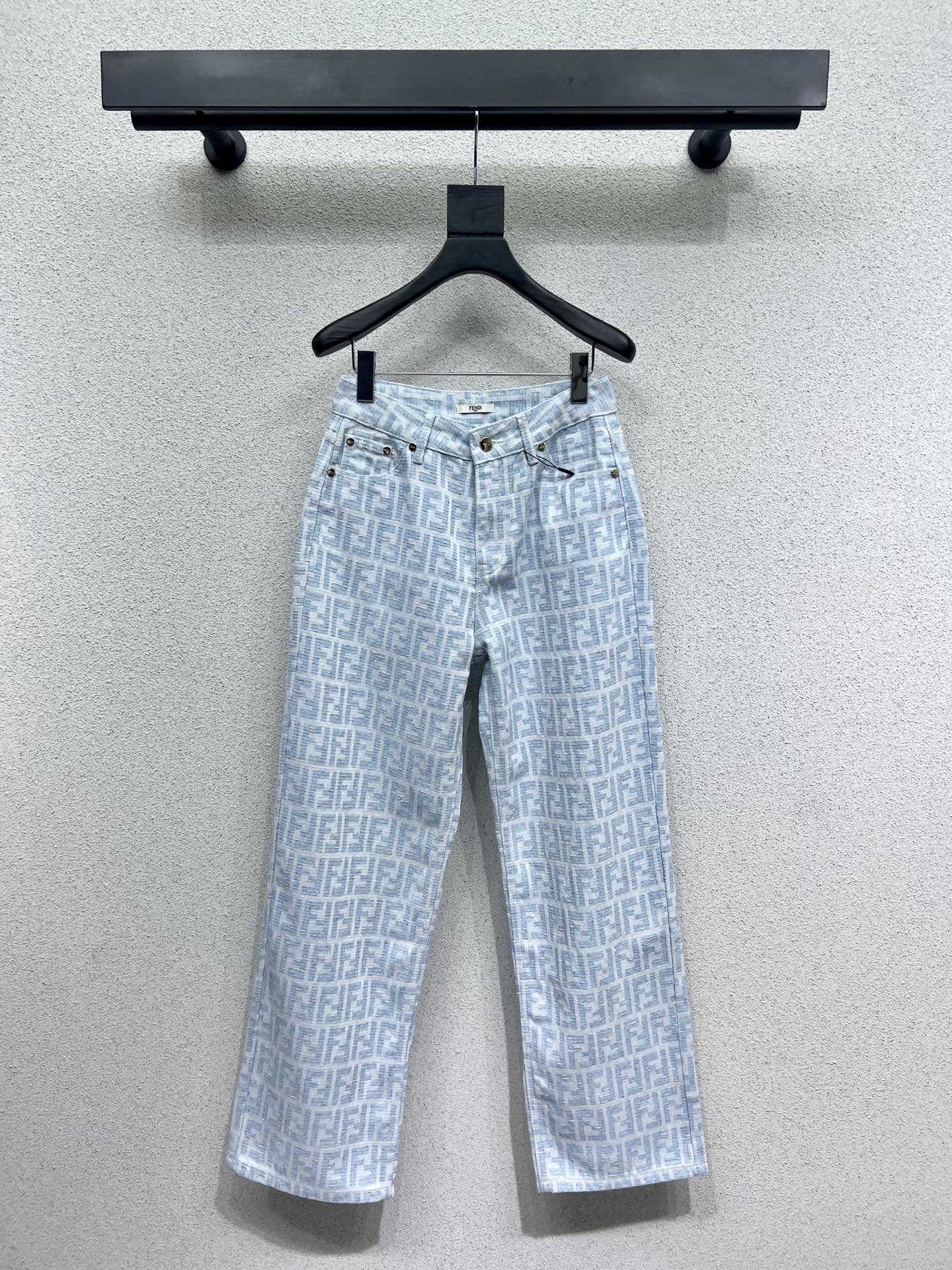 25 Jacquard printed monogram denim trousers