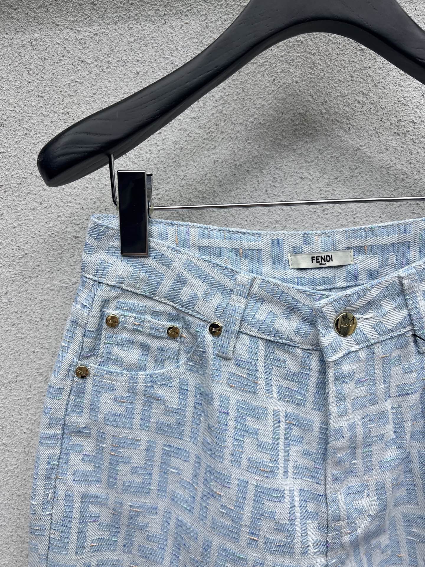 25 Jacquard printed monogram denim trousers