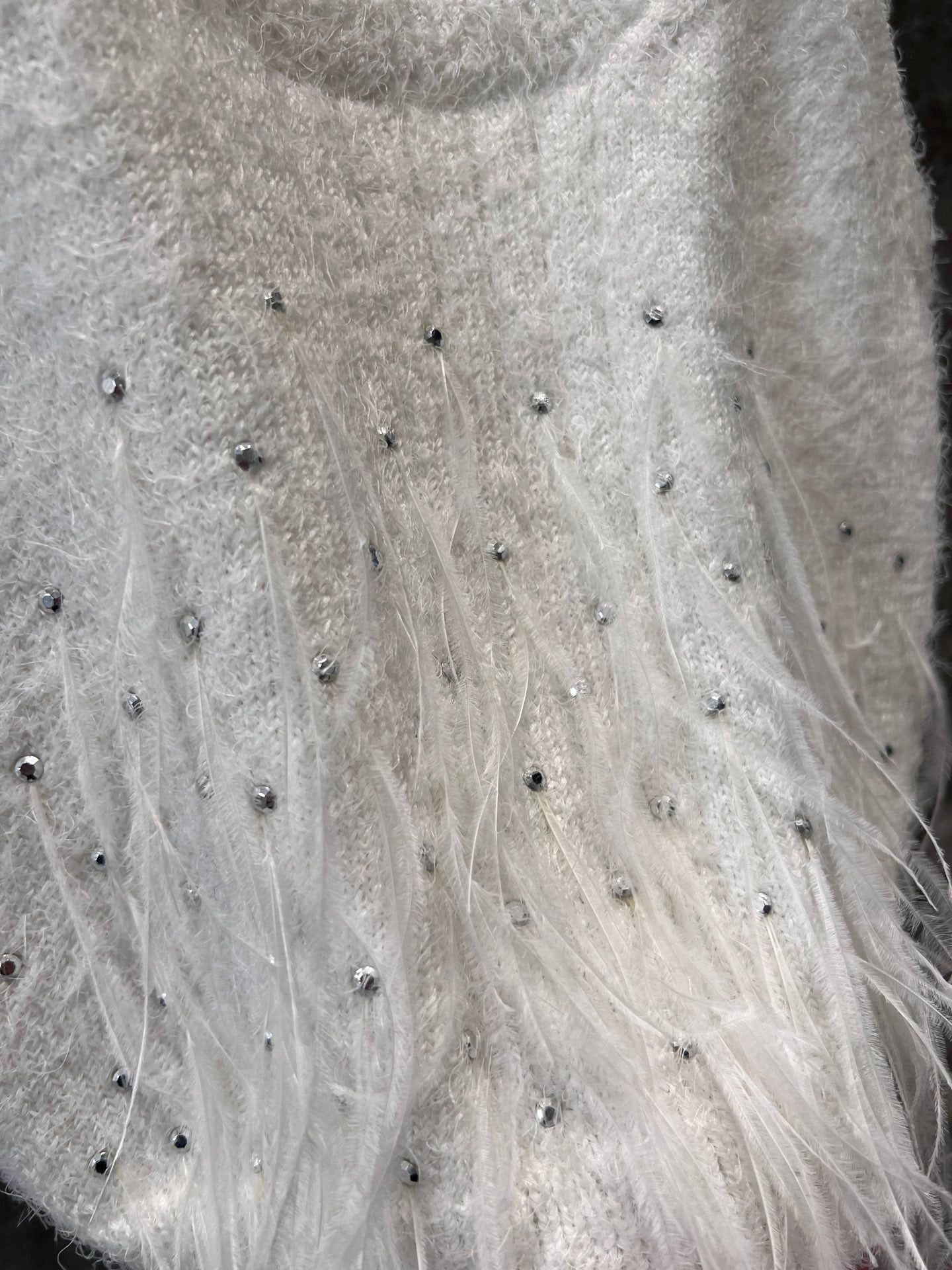 watercolor white feathers stitched backbone