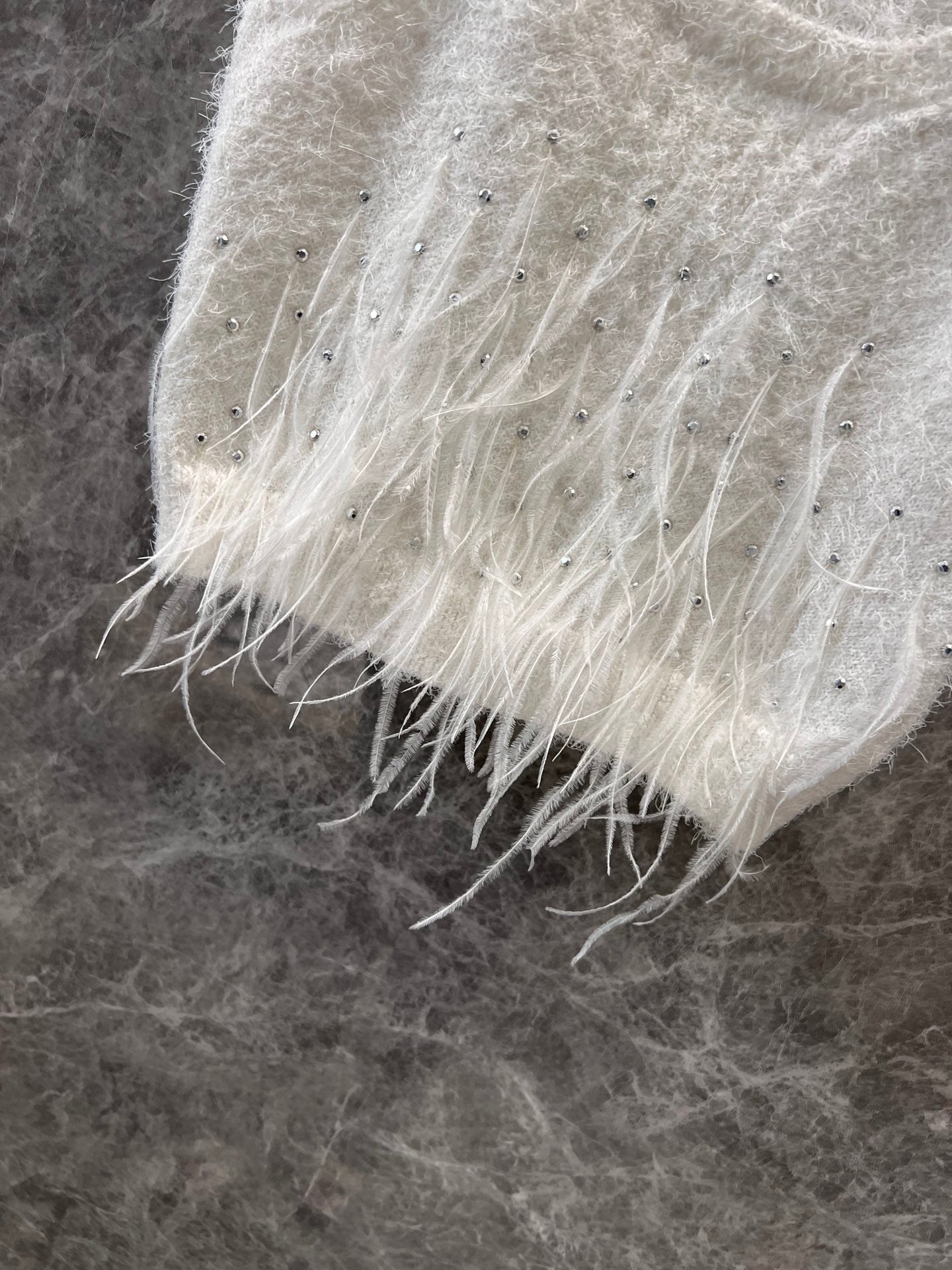 watercolor white feathers stitched backbone