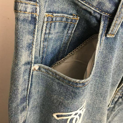 Towel embroidered logo denim trousers