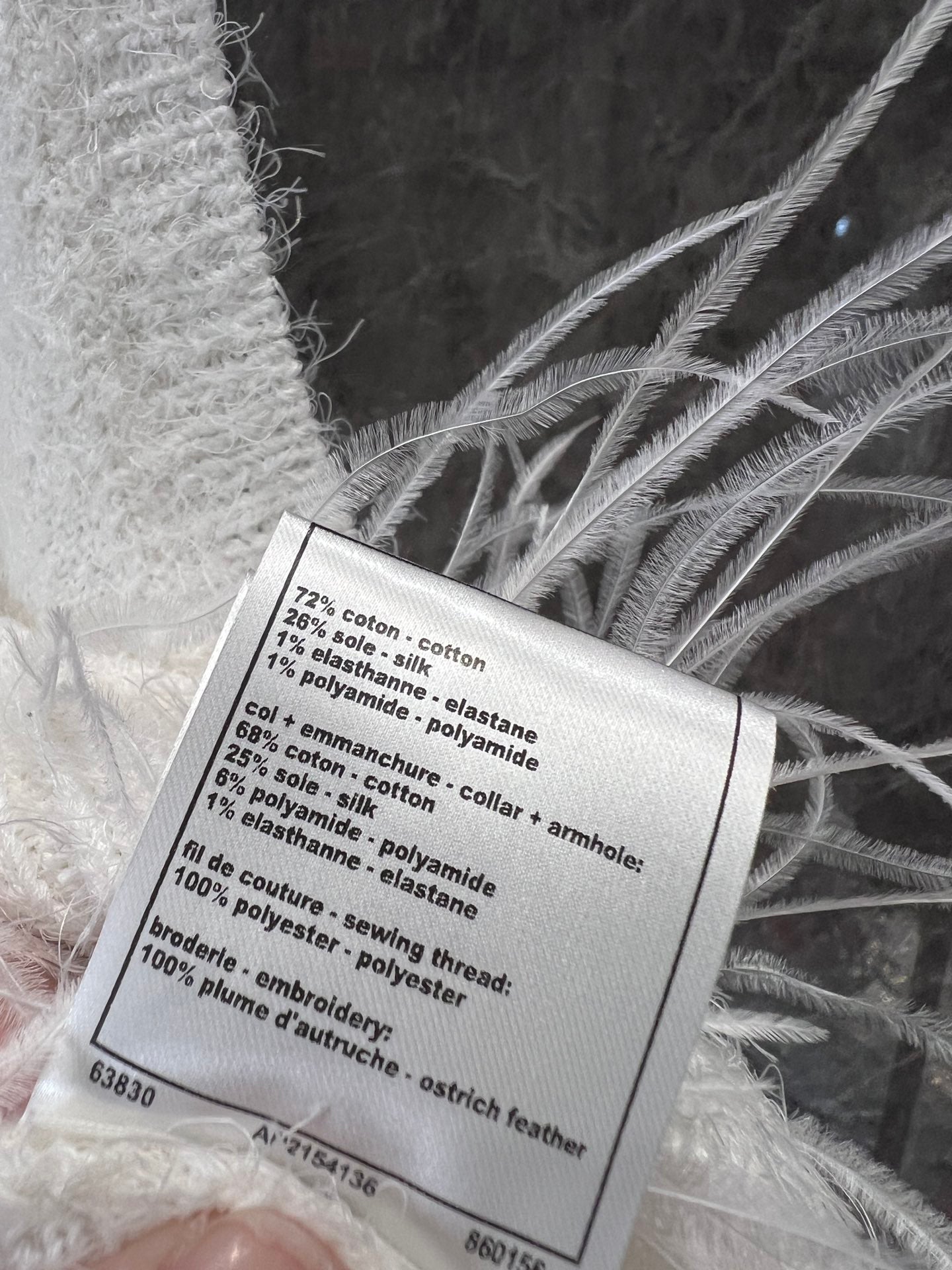 watercolor white feathers stitched backbone